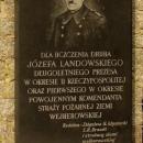 Plaque for Józef Landowski at entry of fire station in Wejherowo